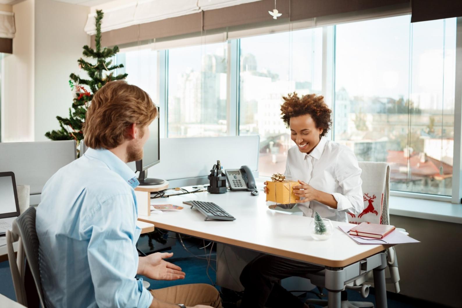 Financial professionals collaborating on technology solutions in modern office environment
