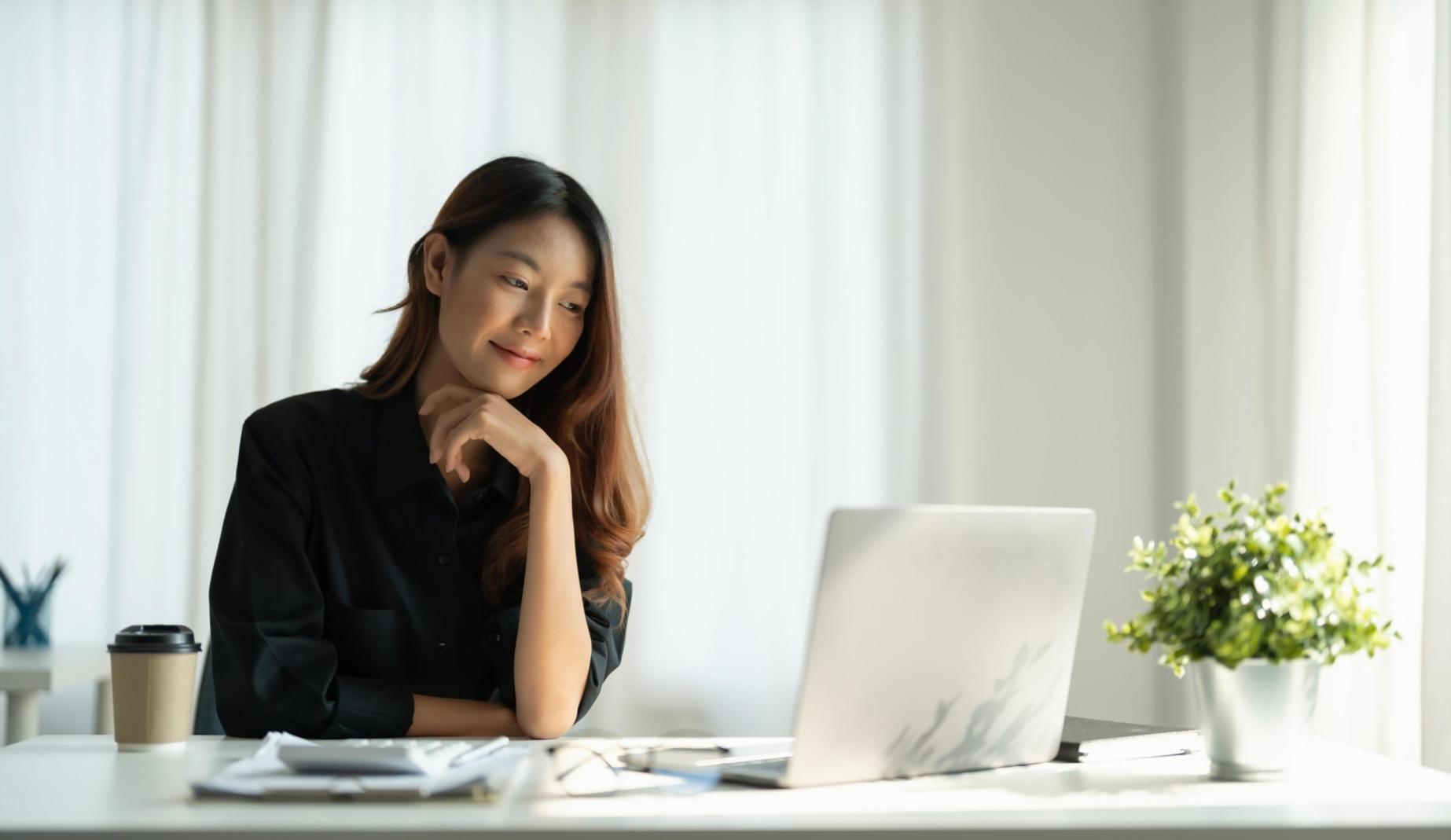 Professional financial technology workspace showing modern tools and collaborative environment