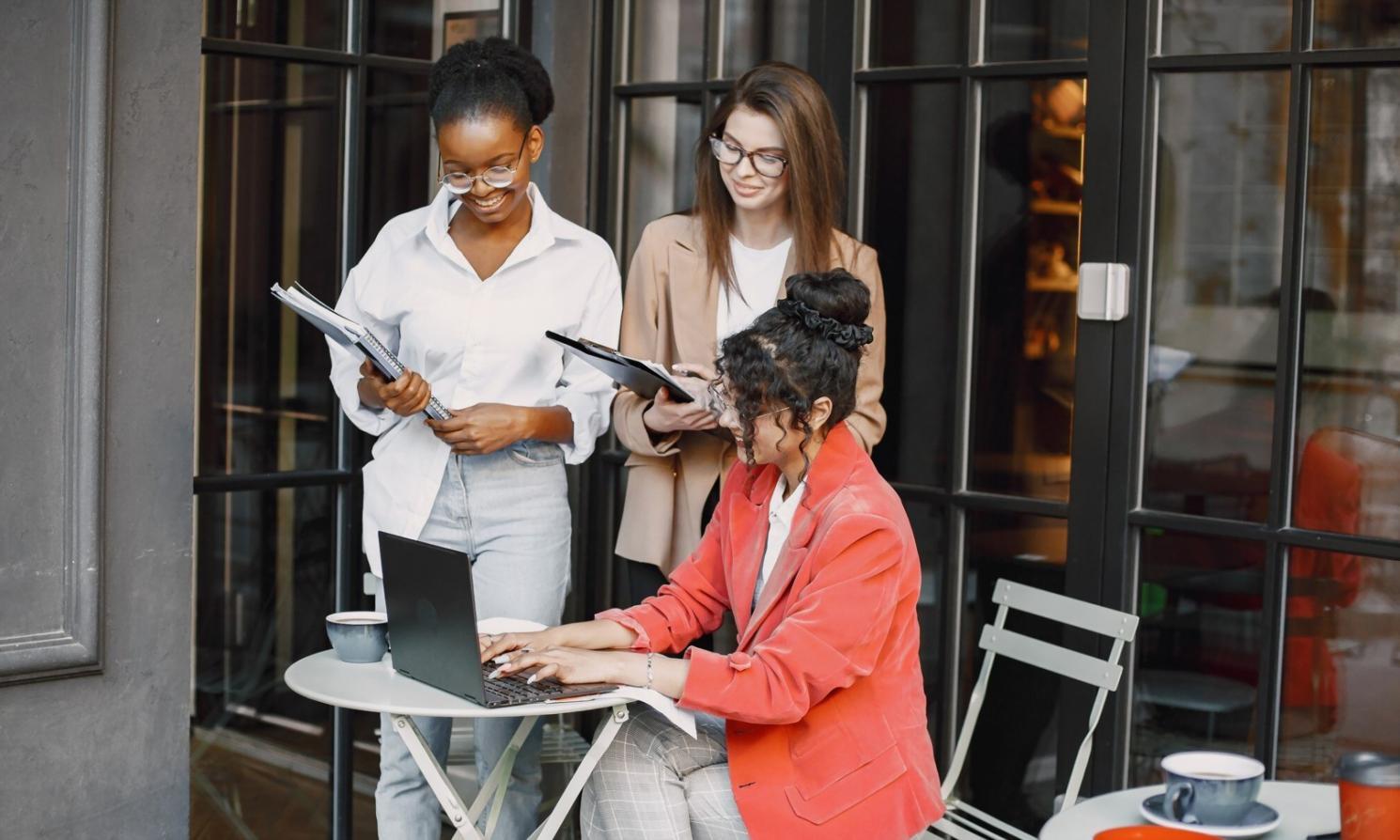 Financial technology professionals collaborating during hands-on workshop session